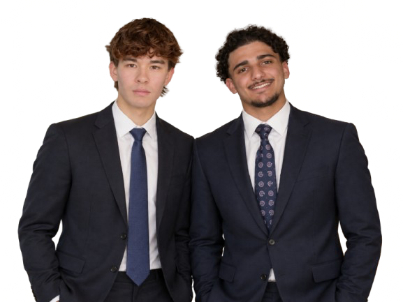 Ibrahim and Luke, Arc & Atom Learning founders and tutors, wearing suits