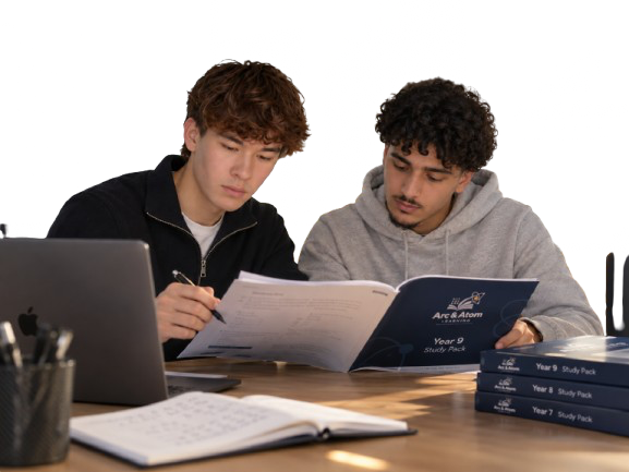 Arc & Atom founders studying together with their custom study books